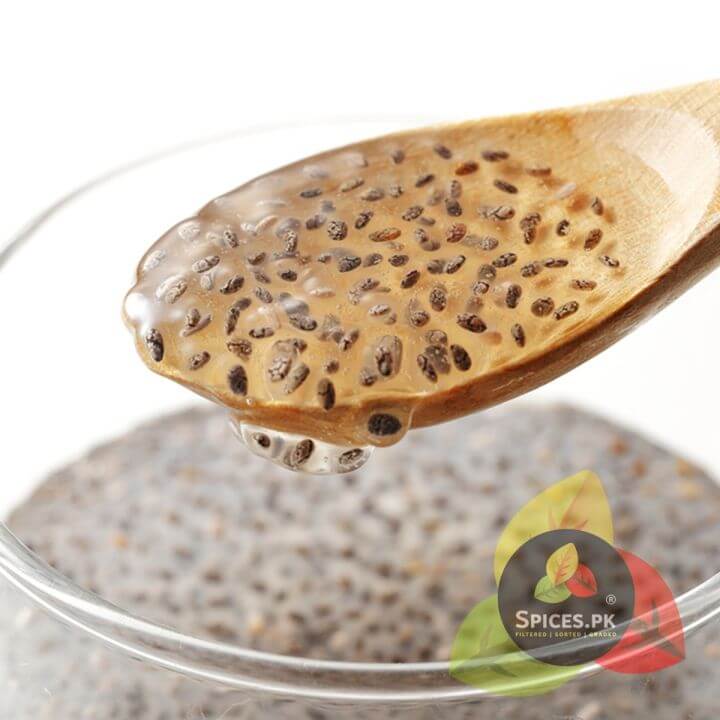Close-up of soaked organic chia seeds on a wooden spoon—high-fiber superfood for healthy digestion.