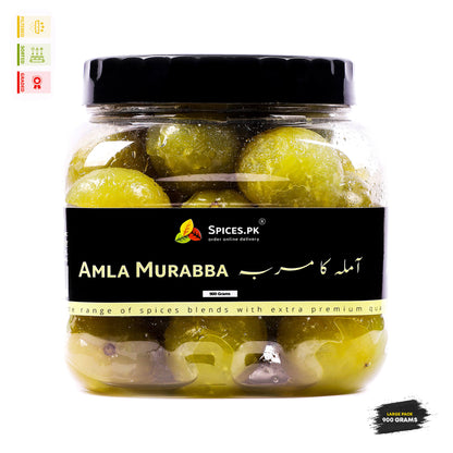 Spices.pk premium Amla Murabba jar of 900 grams alongside fresh green Indian gooseberries, highlighted with quality check markers including sorted, graded, and no artificial preservatives.

Image 2: Natural Fruit on BranchJar of Amla Murabba with Spices.PK label on a white background