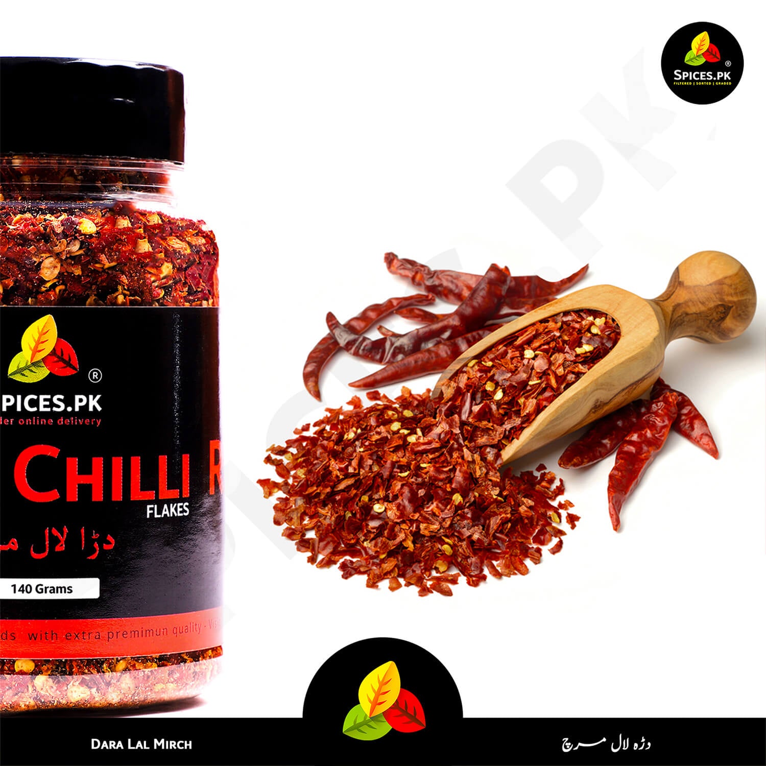 Dara Lal Mirch (Crushed Red Chilli) displayed on a wooden scoop with whole dried peppers for authenticity – Spices.pk.
