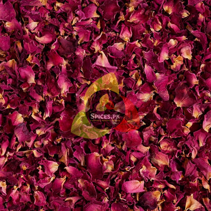 Deep pink sun-dried rose petals used to make natural gulab powder for skincare and glowing face masks in Pakistan.