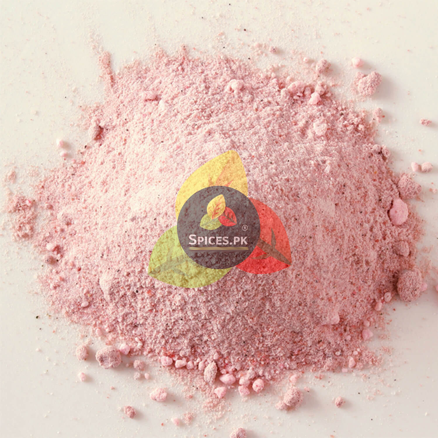 Pink powder with 'Spices.PK' logo in the center.Close-up texture shot of fine-ground natural Black Salt powder by Spices.pk.