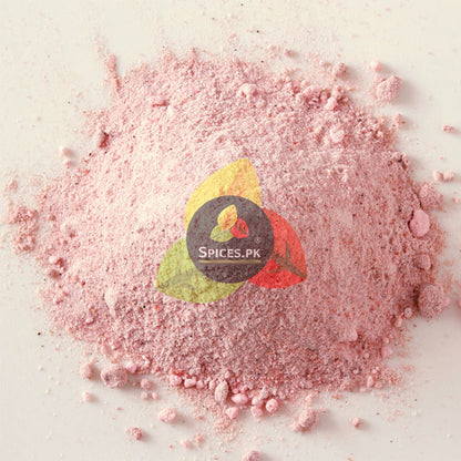 Pink powder with 'Spices.PK' logo in the center.Close-up texture shot of fine-ground natural Black Salt powder by Spices.pk.