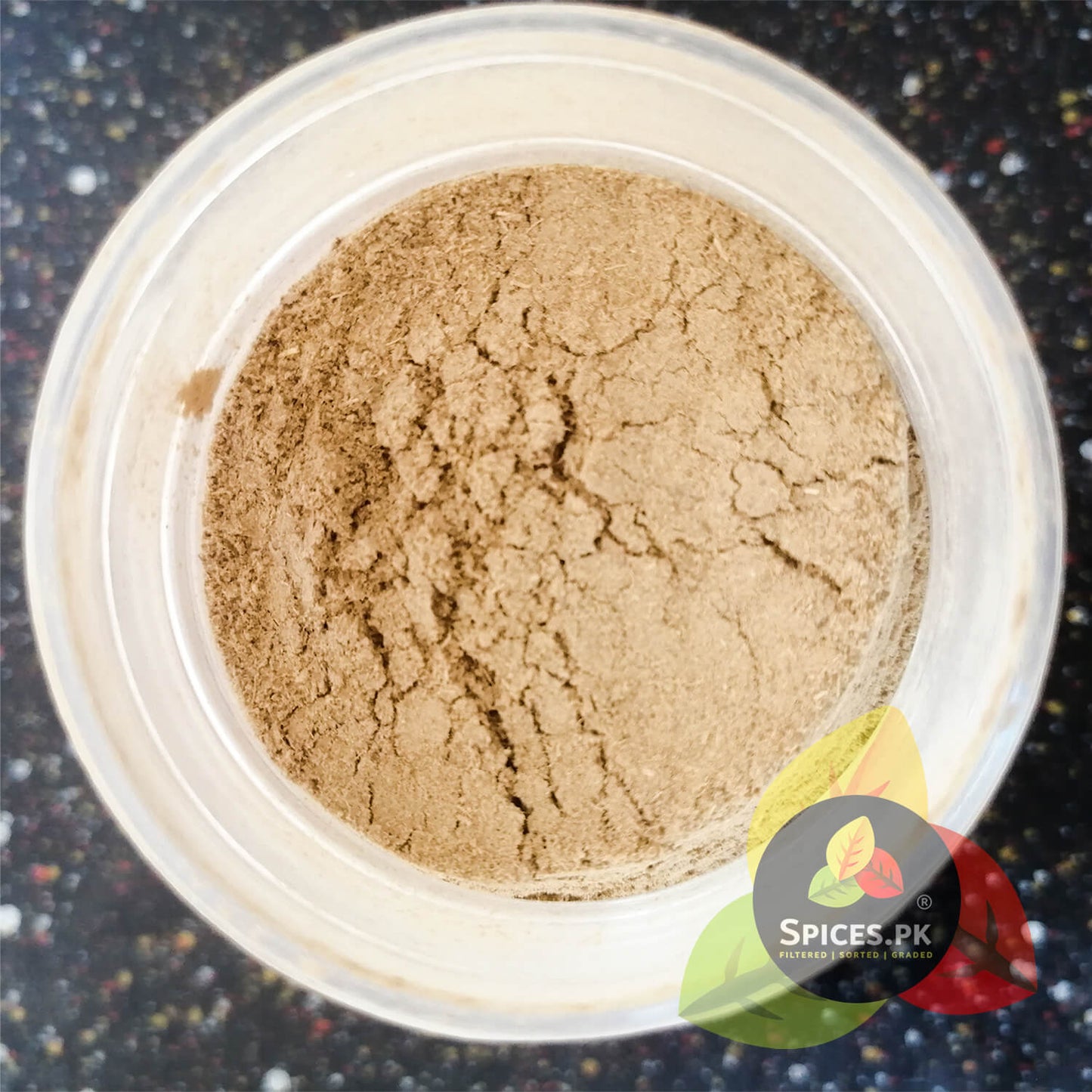 Top-down view of an open jar showing the ultra-fine texture of pure, dust-filtered mulethi licorice powder.