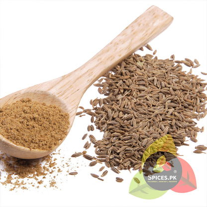A wooden spoon filled with finely ground Cumin Seeds Powder next to a pile of whole raw Sufaid Zeera seeds, showing the natural texture and purity.