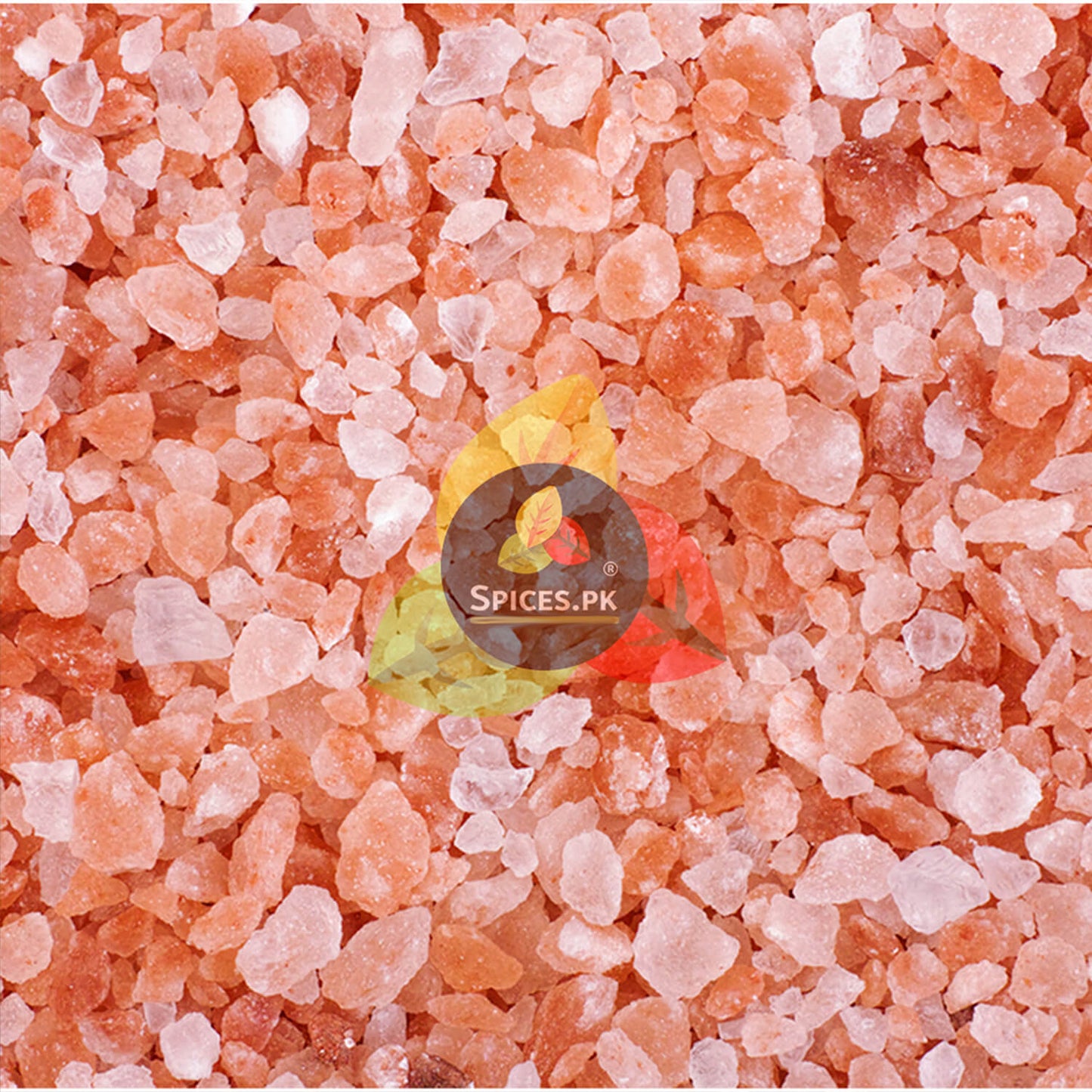 Macro view of authentic Khewra Himalayan pink salt crystals. Unrefined natural rock salt rich in essential trace minerals.Close-up of pink himalayan salt with Spices.PK logo in the center.