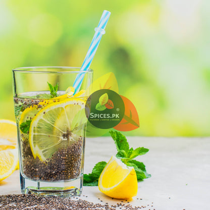 SEO Alt Text: A refreshing weight loss detox drink with soaked chia seeds, fresh lemon slices, mint leaves, and a straw in a clear glass.