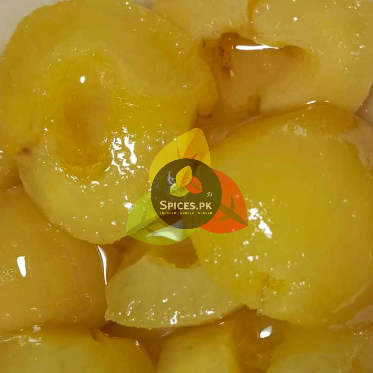Close-up of Spices.pk golden Bahi Murabba pieces in natural syrup. Delicious, pure quince preserve with no artificial colors.