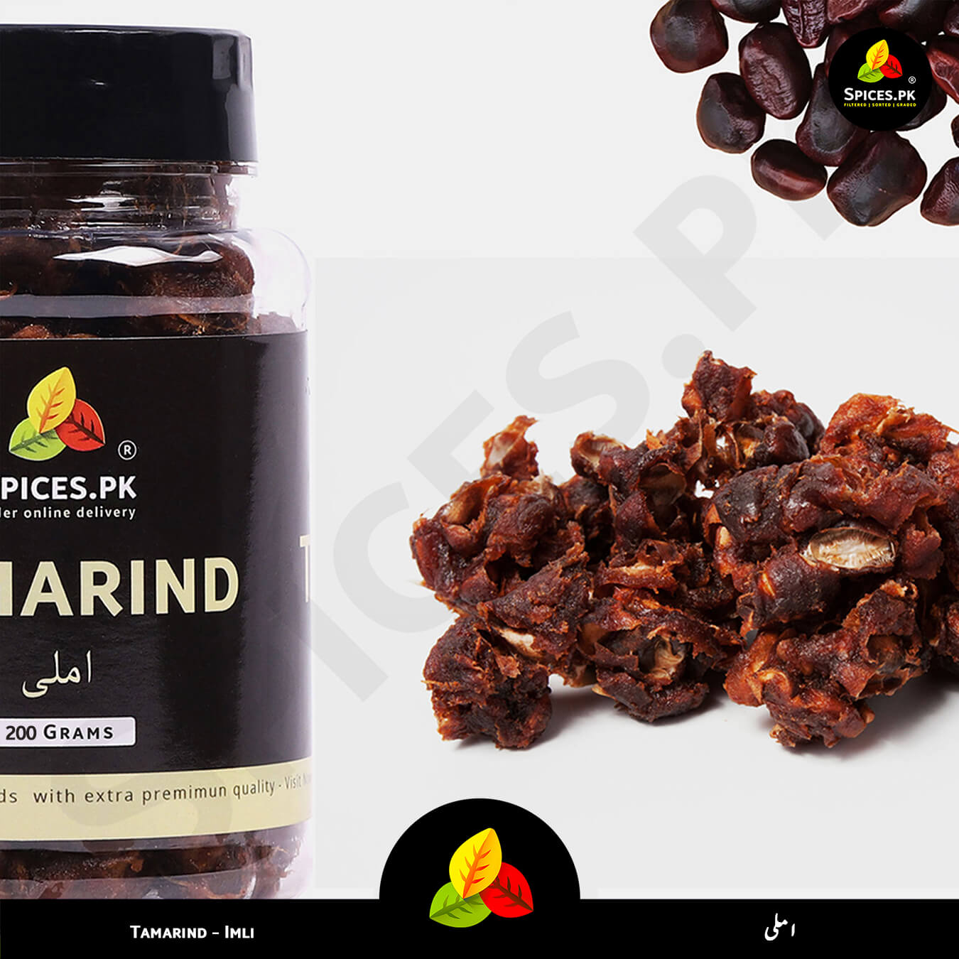 Jar of tamarind with tamarind pieces on a white background.Spices.pk Tamarind (Imli) ingredients: Sourced from the finest organic orchards, ensuring an authentic tangy taste for traditional recipes.