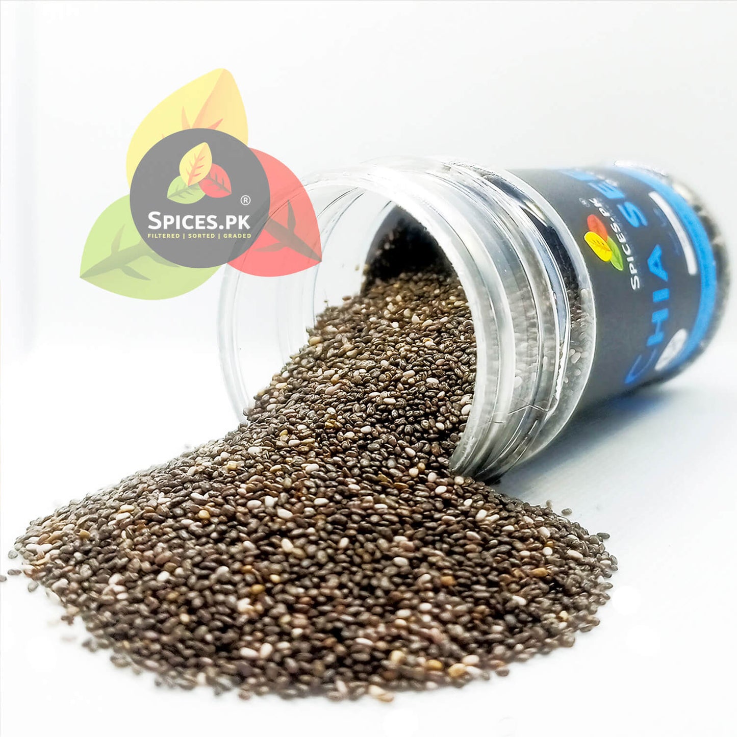 High-quality black and white chia seeds spilling out of a clear Spices.pk plastic shaker bottle on a white background.