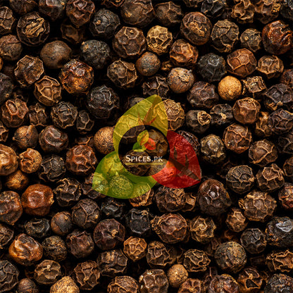 Detailed top-down texture view of high-quality, whole Black Peppercorns with a Spices.pk logo overlay.