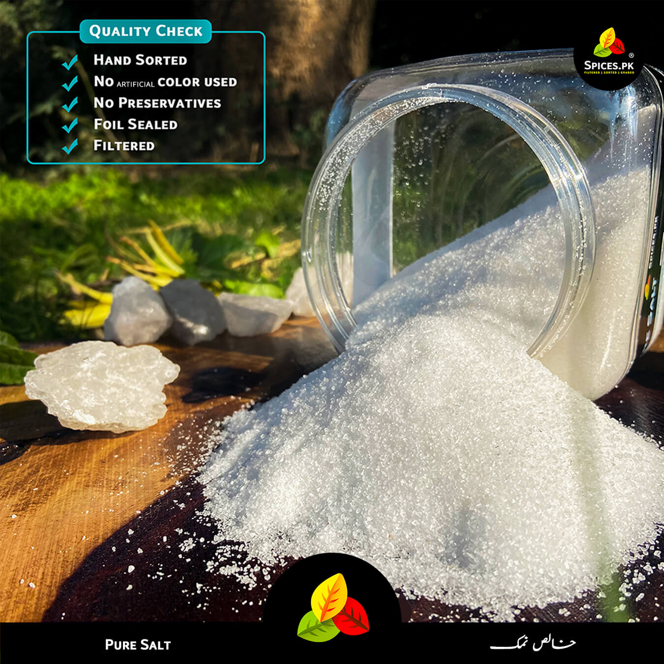 Spices.PK pure salt being poured from a clear container on a wooden surface with natural light.Close-up texture of Spices.pk Pure Salt, natural rock salt granules in a 1200g jar.
