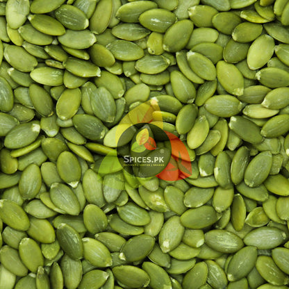 Macro close-up texture of unroasted green pumpkin seeds (pepitas), rich in zinc and magnesium for a healthy diet.